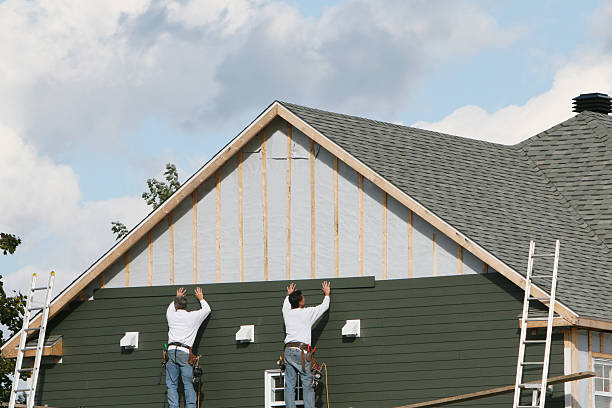 Professional Siding Installation technician working in Zebulon, NC